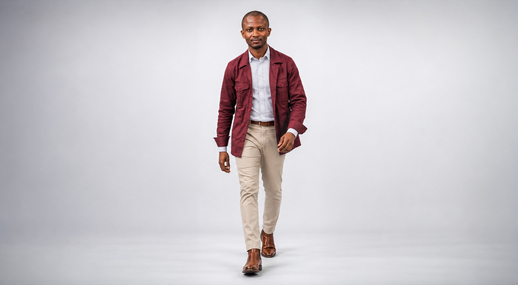 Kevin Kouadio walking, burgundy jacket
